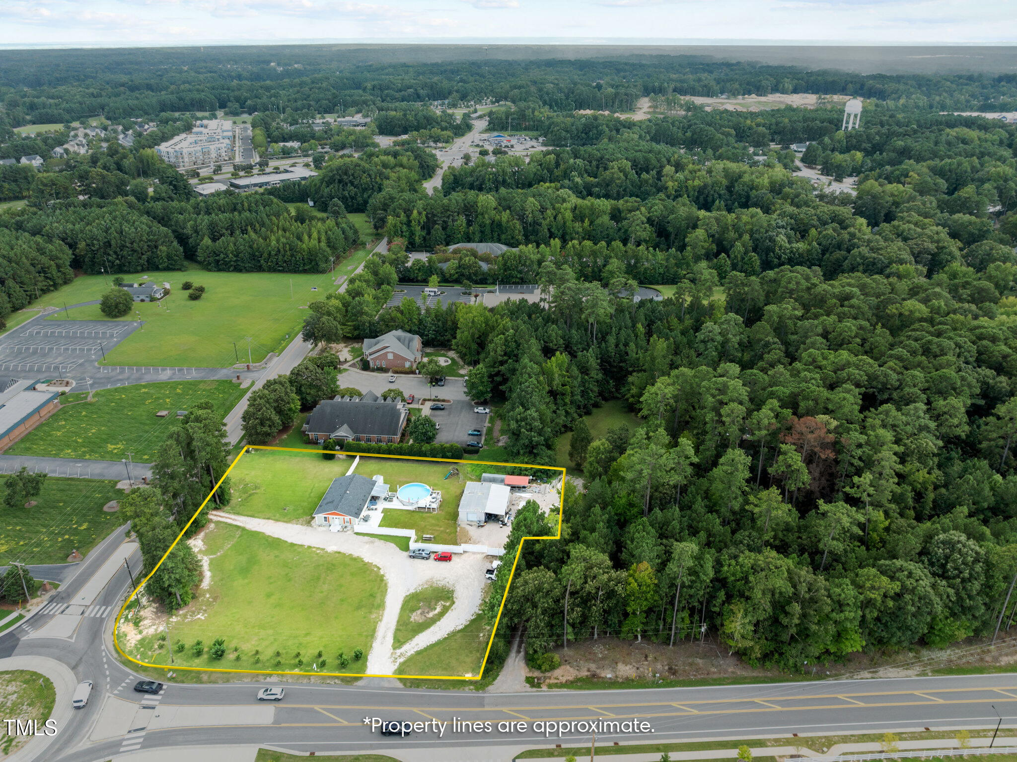 949 Old Knight Road Knightdale, NC 27545 - Photo 2 of 27 an aerial view of a house with yard swimming pool and outdoor seating