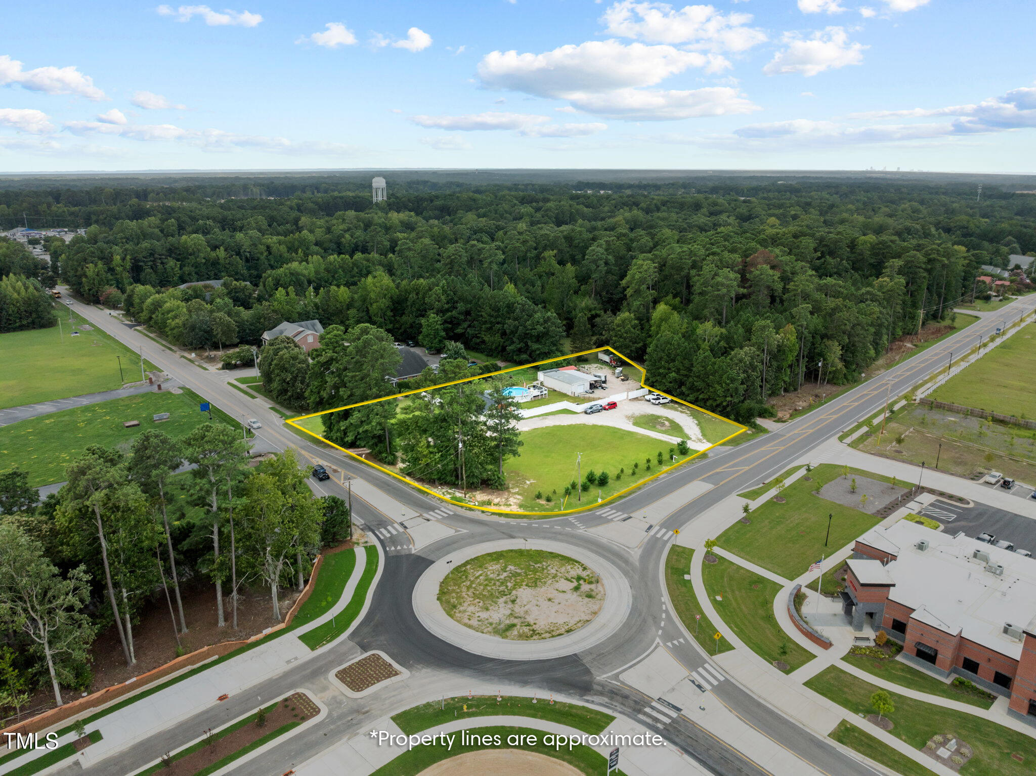 949 Old Knight Road Knightdale, NC 27545 - Photo 4 of 27 a wooden table with chairs and wooden floor