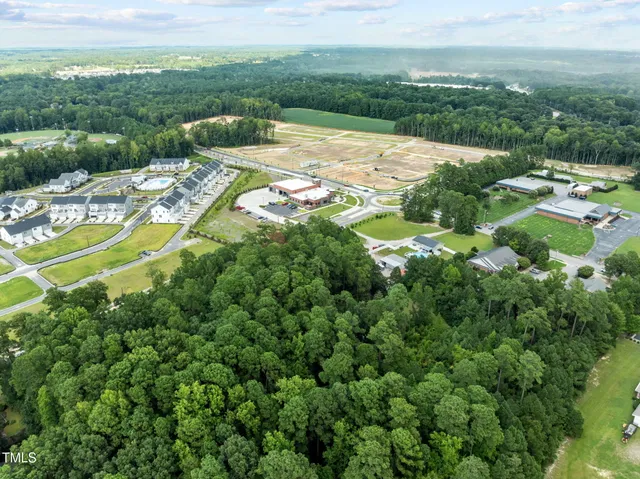 a view of a lake with a city