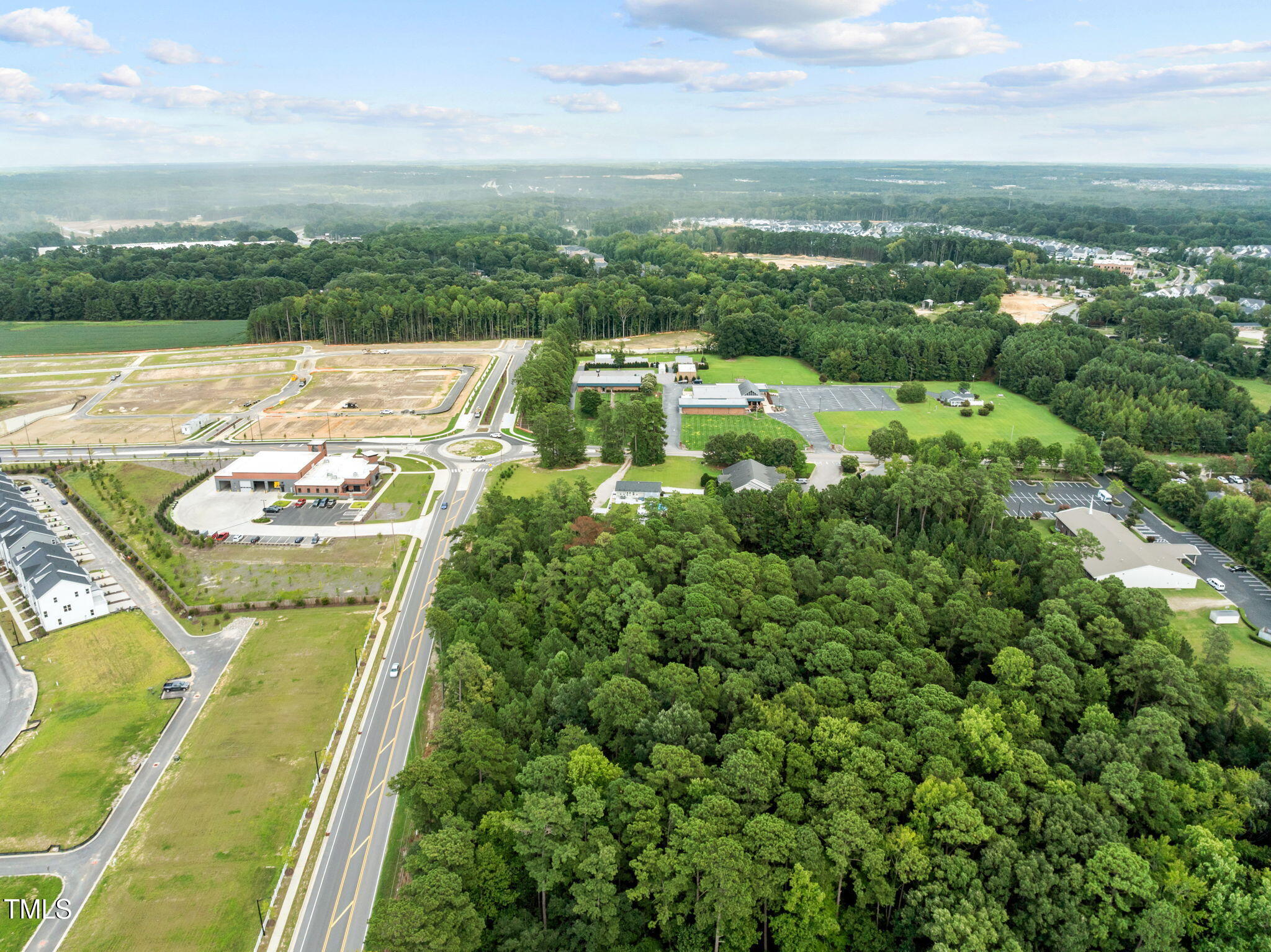 949 Old Knight Road Knightdale, NC 27545 - Photo 9 of 27 an aerial view of a house with a garden