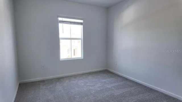 an empty room with a window
