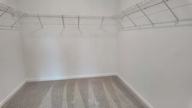 a view of a room with racks on the wall