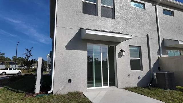 a front view of a house with yard