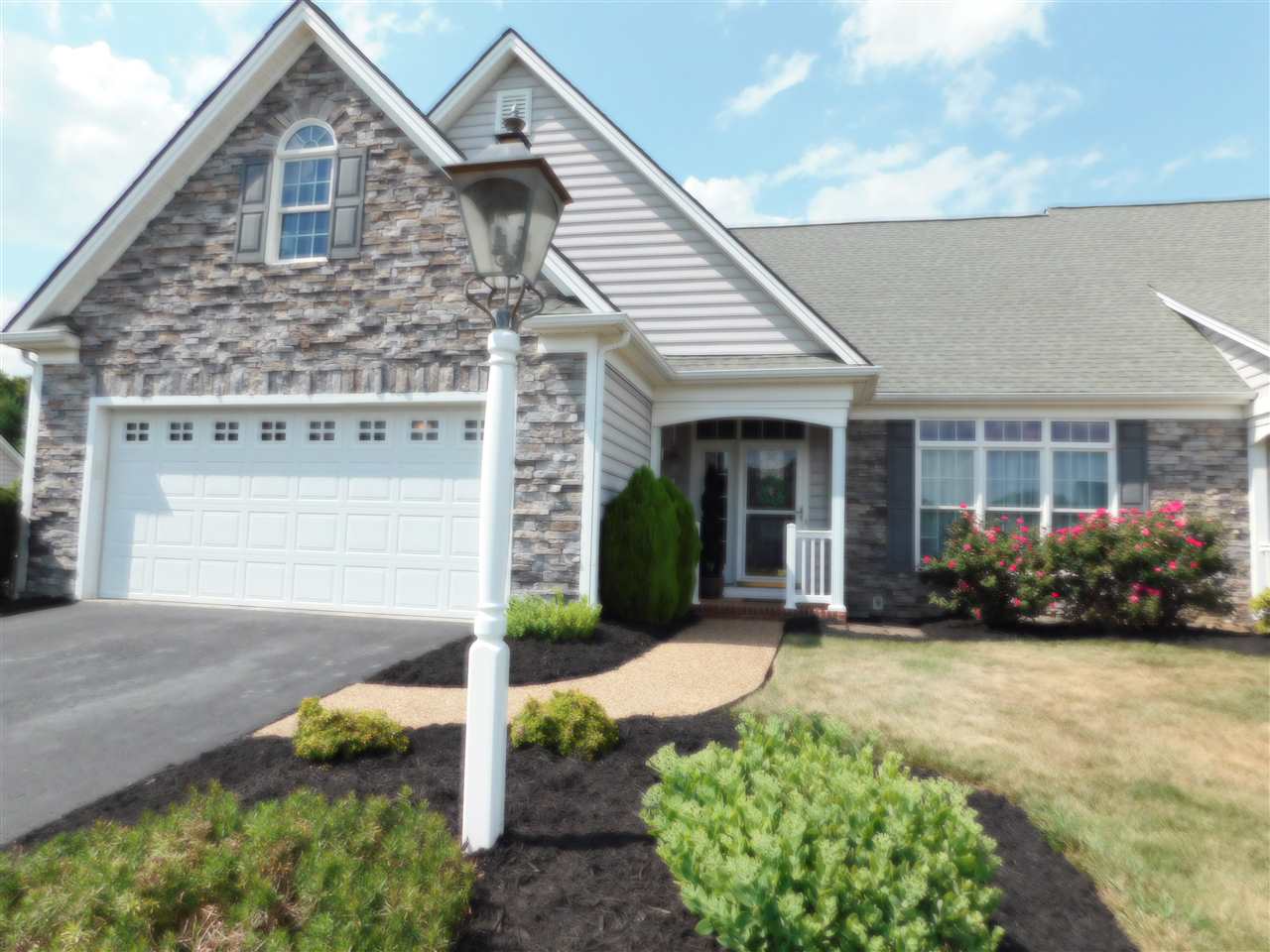 52 Hunters Trail Waynesboro, VA 22980 - Photo 1 of 32 a front view of a house with garden