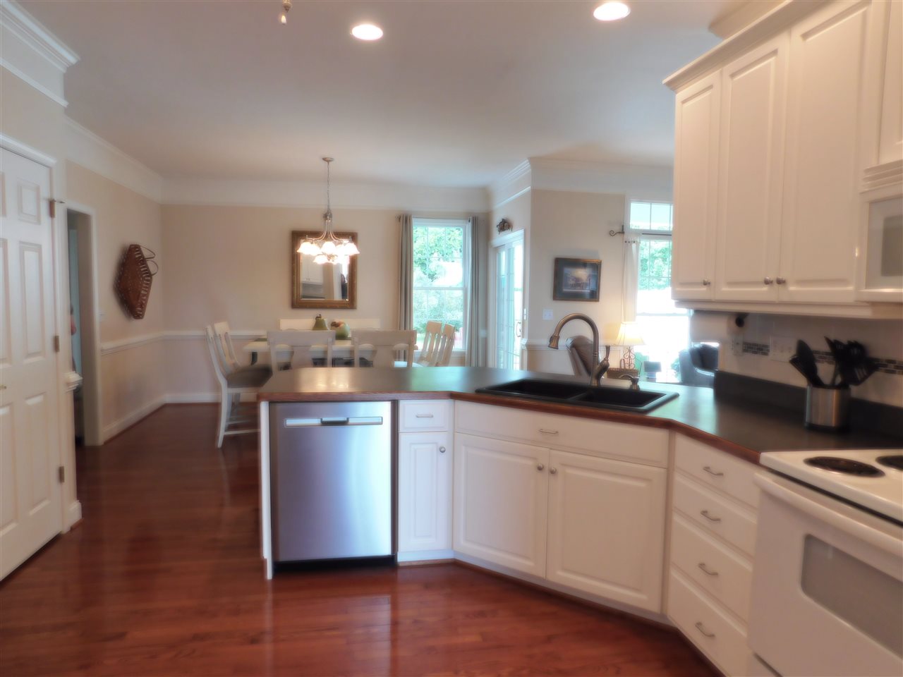 52 Hunters Trail Waynesboro, VA 22980 - Photo 13 of 32 a kitchen with a sink cabinets and wooden floor