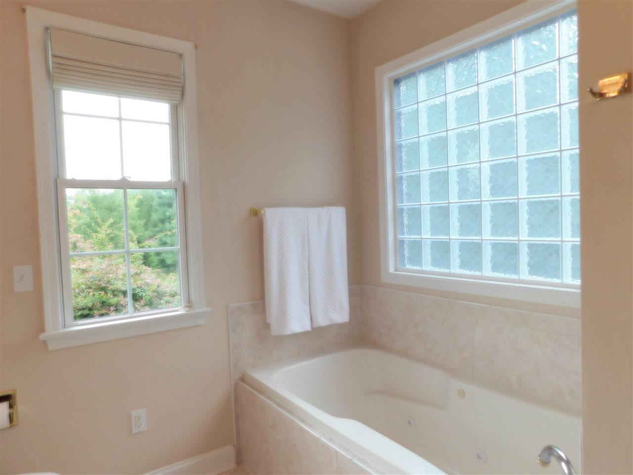 52 Hunters Trail Waynesboro, VA 22980 - Photo 23 of 32 a white bath tub sitting next to a window