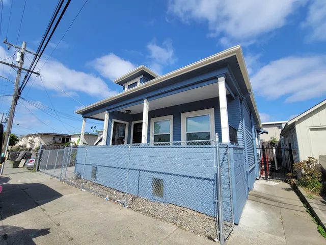 a view of house with a street