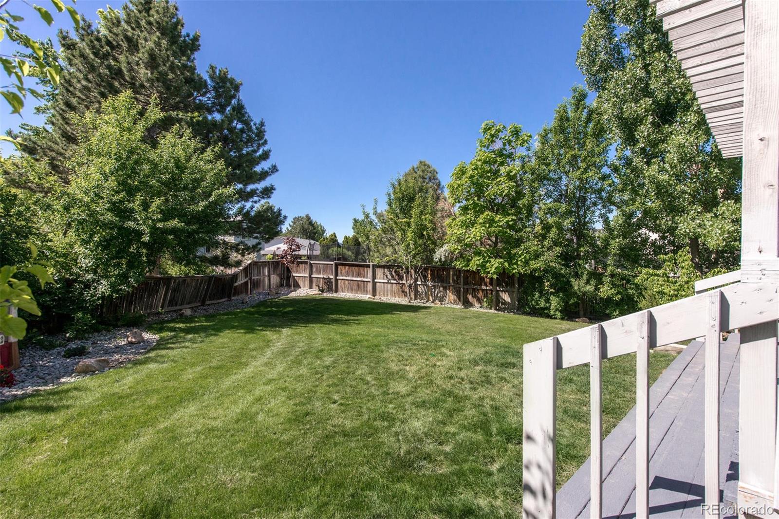 100 Prairie Ridge Road Highlands Ranch, CO 80126 - Photo 34 of 34 a view of a garden with a small yard