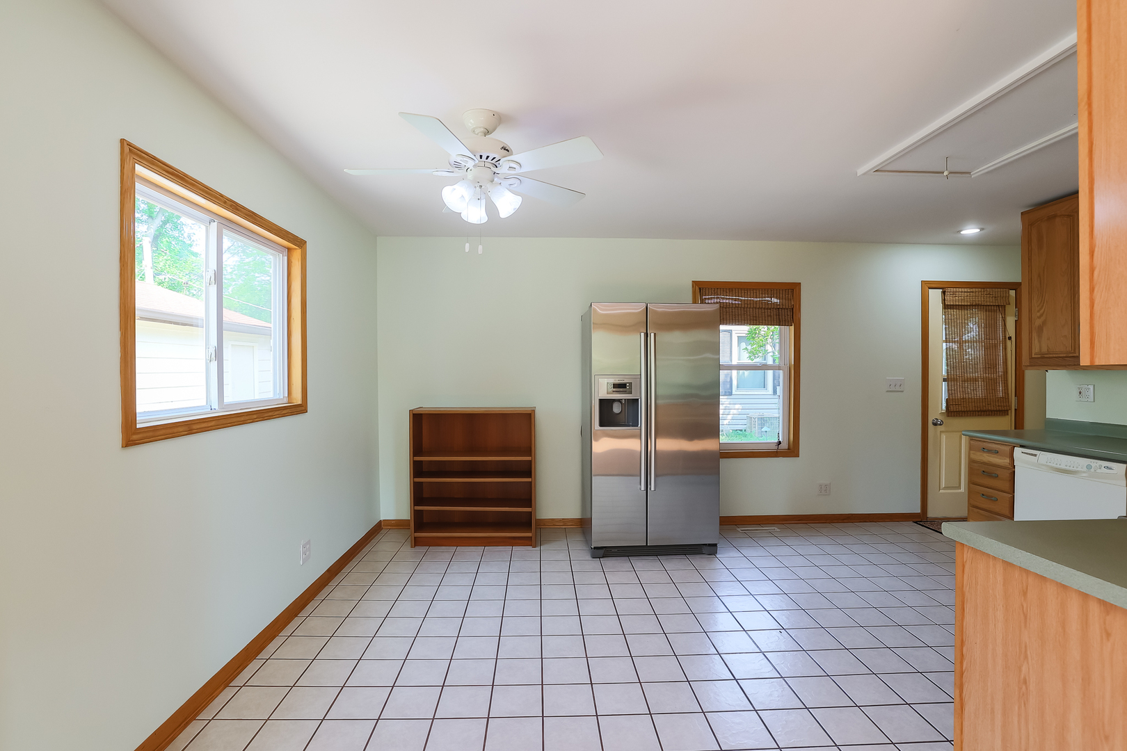 353 Raupp Boulevard Buffalo Grove, IL 60089 - Photo 16 of 28 a view of empty room with a kitchen