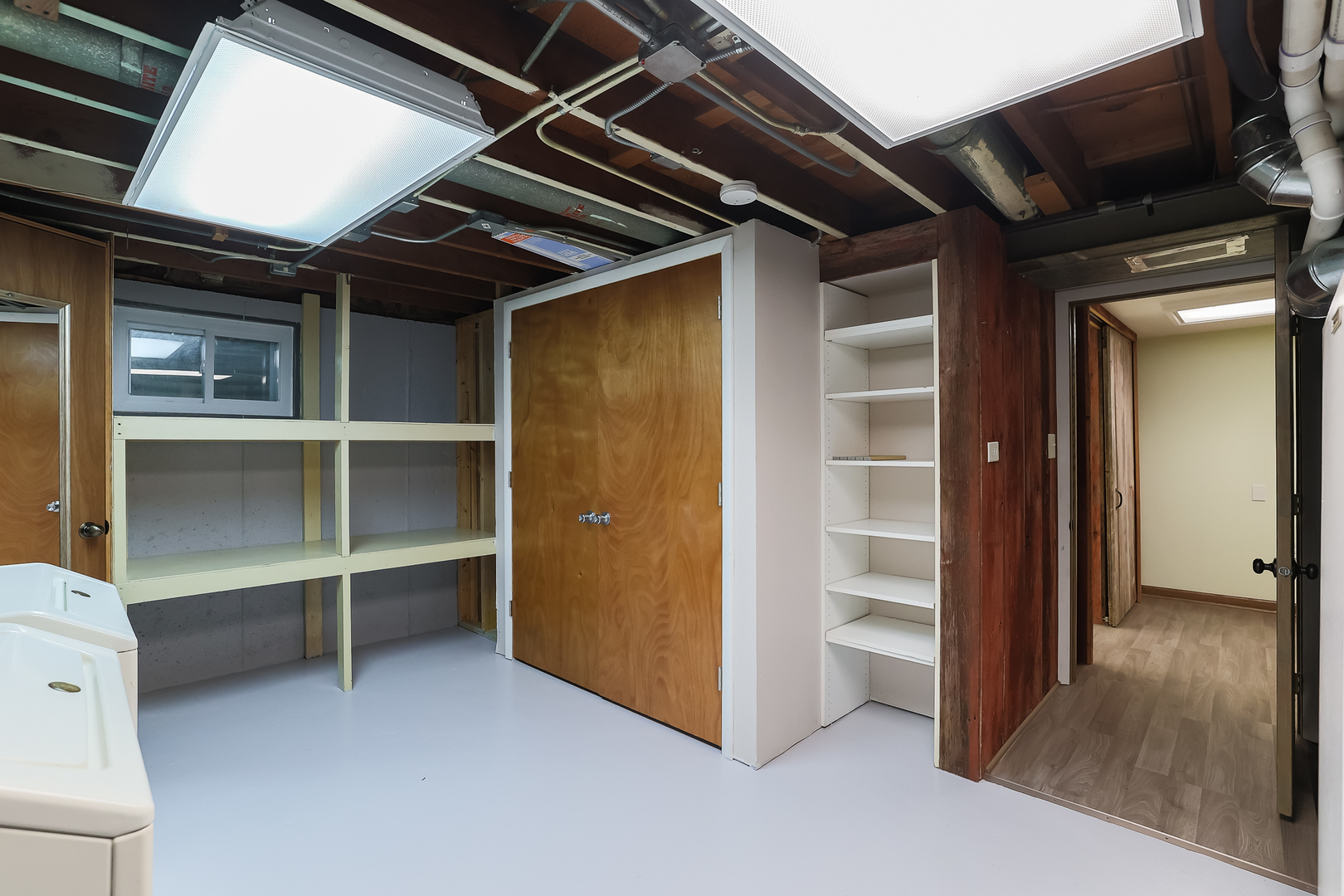 353 Raupp Boulevard Buffalo Grove, IL 60089 - Photo 25 of 28 a view of an empty room with wooden floor