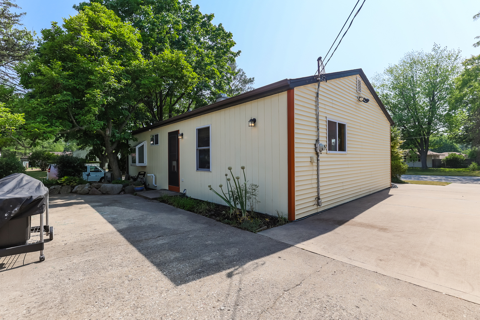 353 Raupp Boulevard Buffalo Grove, IL 60089 - Photo 26 of 28 a view of a house with a yard
