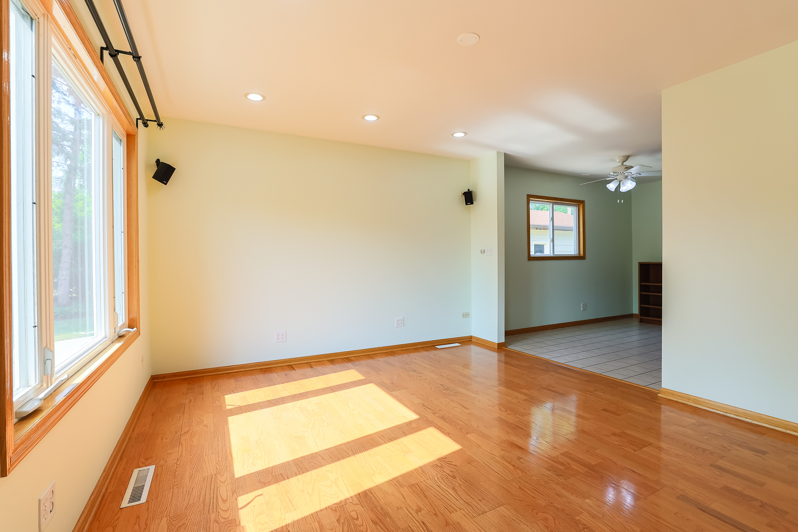 353 Raupp Boulevard Buffalo Grove, IL 60089 - Photo 8 of 28 a view of an empty room with a window