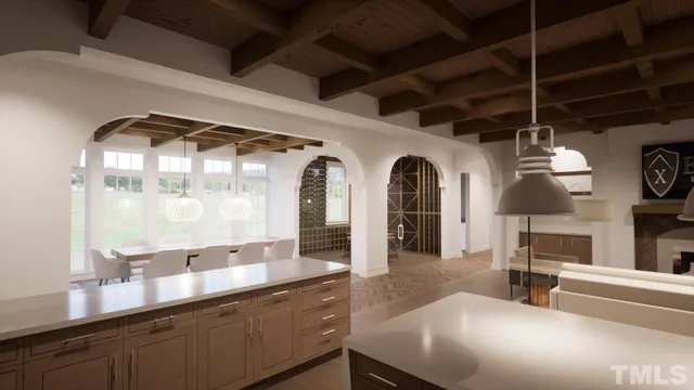 a view of a living room and bathroom with a large mirror