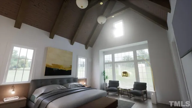 a bedroom with furniture and a large window