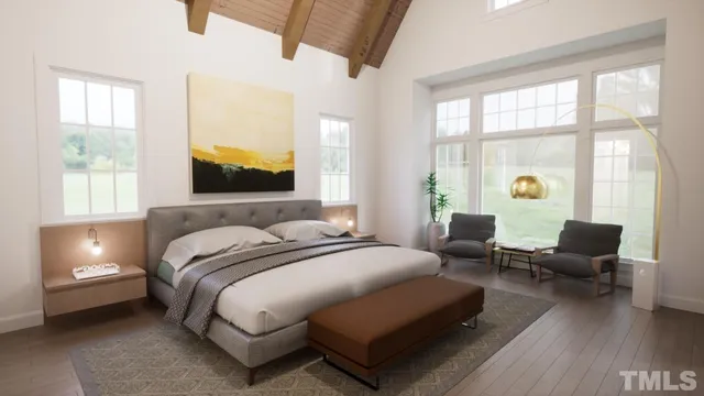 a bedroom with a bed couch and window