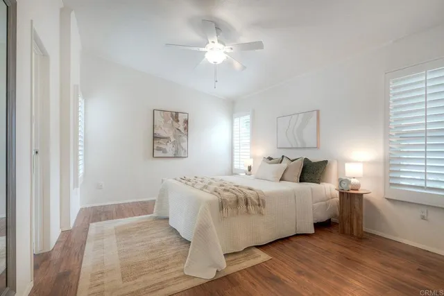 a room with a bed and window