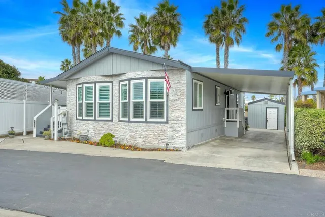 a front view of a house with a patio