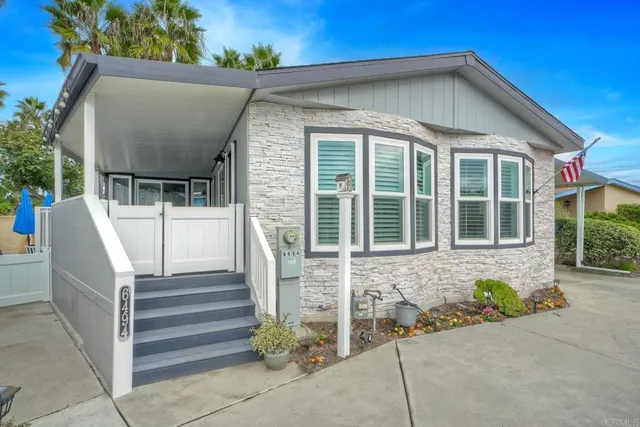 a front view of a house with a garage