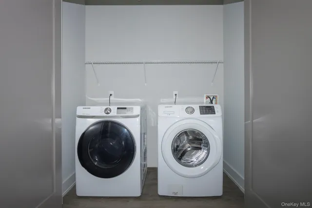 a utility room with dryer and washer
