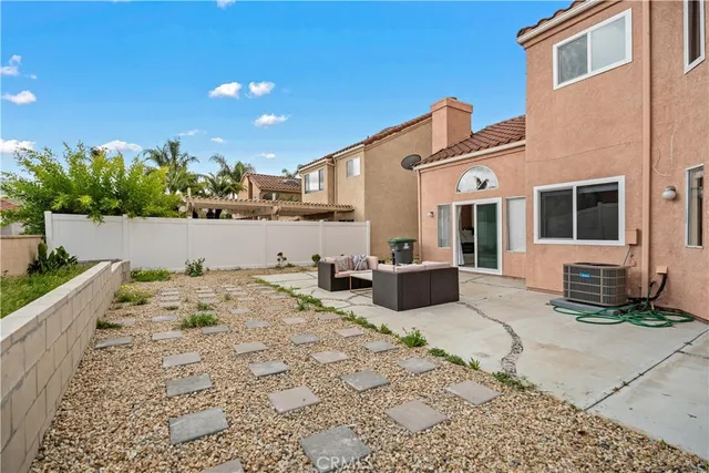 a view of a living room and workspace