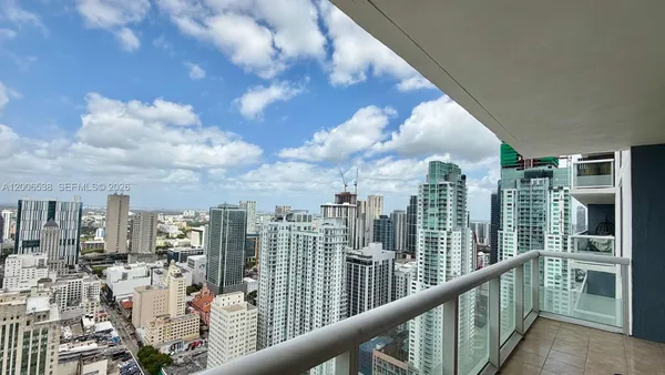 a view of a balcony with city view