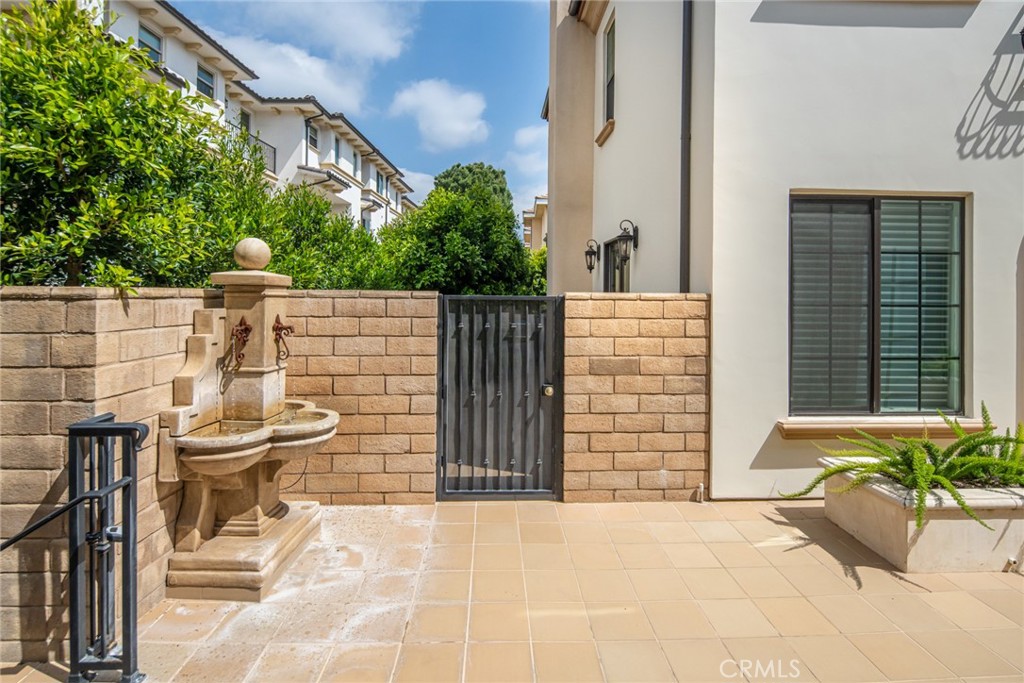 1019 Holly Avenue, Unit A Arcadia, CA 91007 - Photo 10 of 40 a view of a patio with table and chairs and potted plants