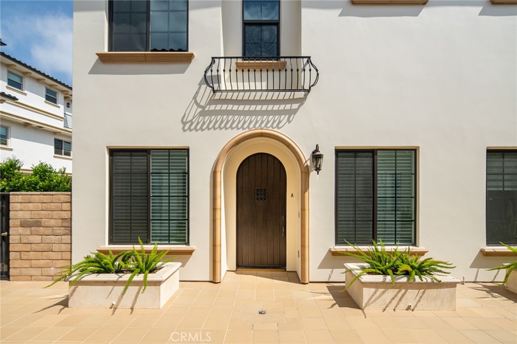 1019 Holly Avenue, Unit A Arcadia, CA 91007 - Photo 12 of 40 a view of a brick house with potted plants