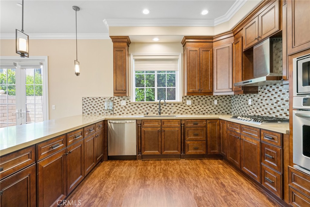 1019 Holly Avenue, Unit A Arcadia, CA 91007 - Photo 20 of 40 a kitchen with stainless steel appliances sink cabinets and window