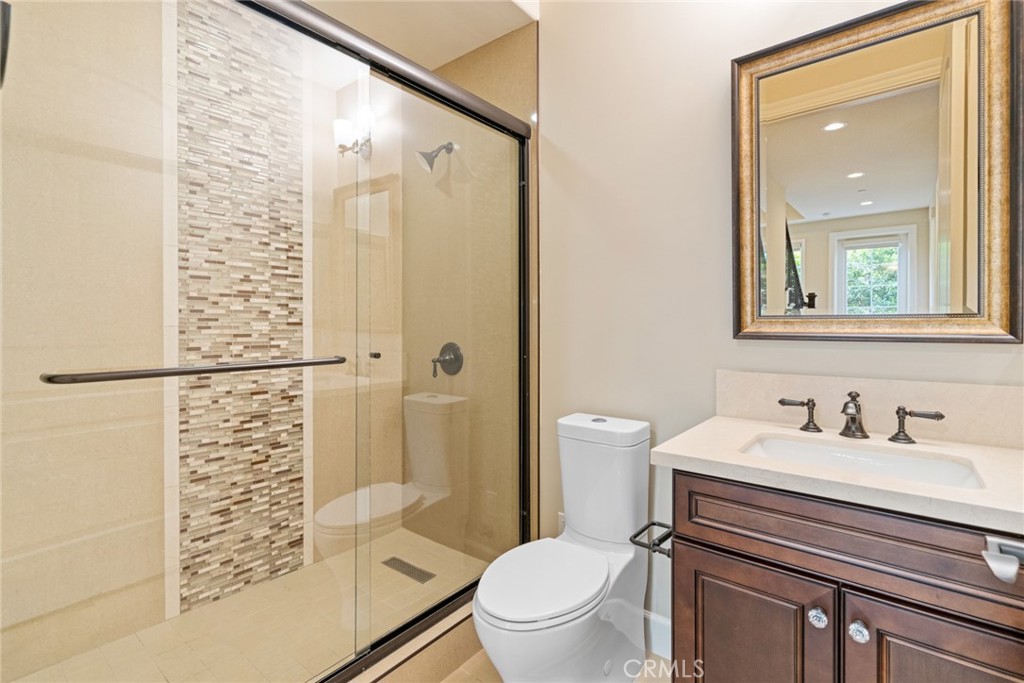 1019 Holly Avenue, Unit A Arcadia, CA 91007 - Photo 21 of 40 a bathroom with a sink a toilet and shower