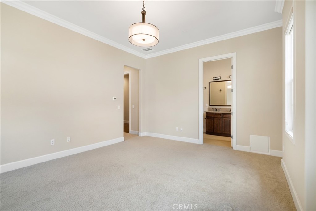 1019 Holly Avenue, Unit A Arcadia, CA 91007 - Photo 26 of 40 an empty room with closet and windows