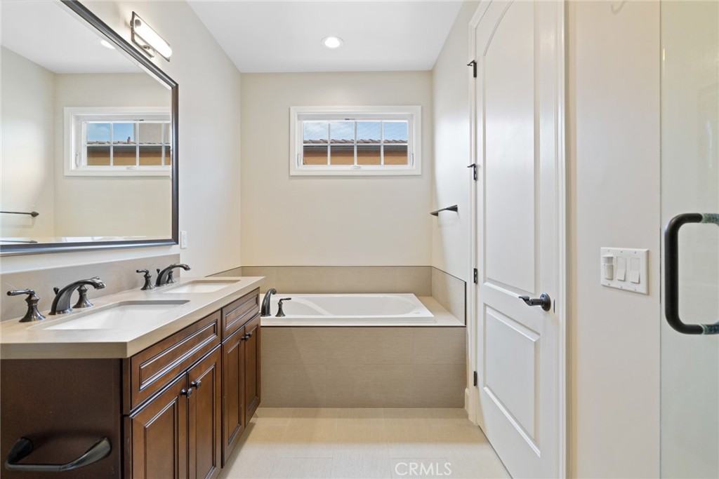1019 Holly Avenue, Unit A Arcadia, CA 91007 - Photo 28 of 40 a bathroom with a sink and a bathtub