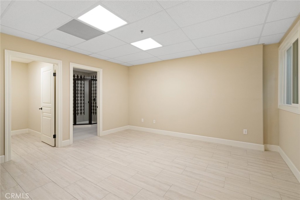 1019 Holly Avenue, Unit A Arcadia, CA 91007 - Photo 32 of 40 an empty room with closet and a window