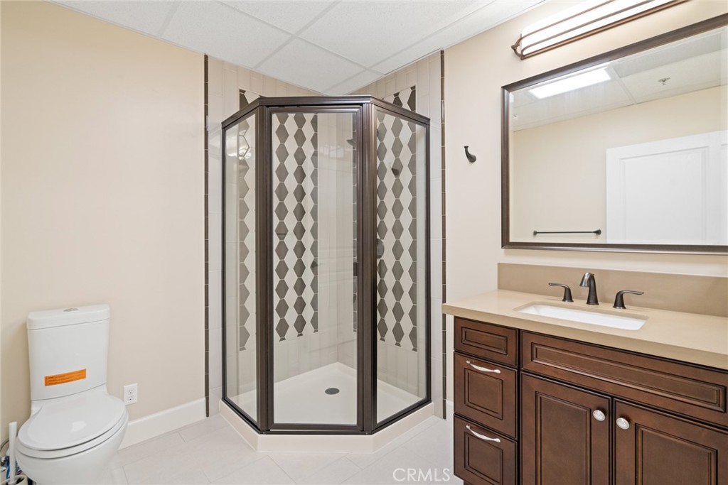 1019 Holly Avenue, Unit A Arcadia, CA 91007 - Photo 34 of 40 a bathroom with a sink a toilet and shower
