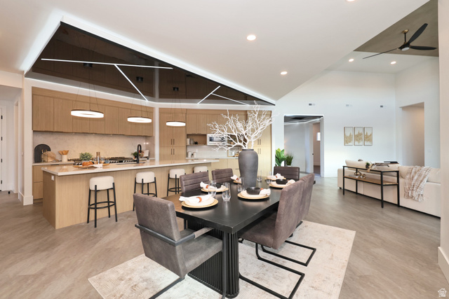1306 East Victor Lane Draper, UT 84020 - Photo 16 of 60 Dining space featuring a high ceiling, recessed lighting, and a ceiling fan