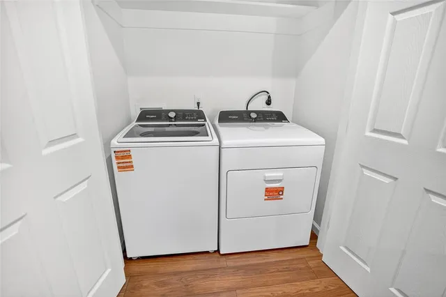 a utility room with dryer and washer
