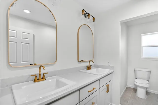 a bathroom with a sink and a toilet