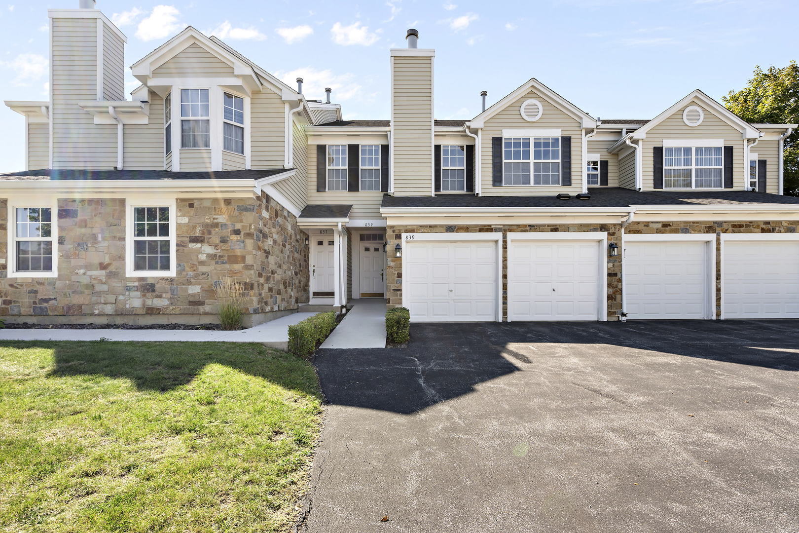 839 Lansing Court Vernon Hills, IL 60061 - Photo 1 of 2 a front view of a house with a yard