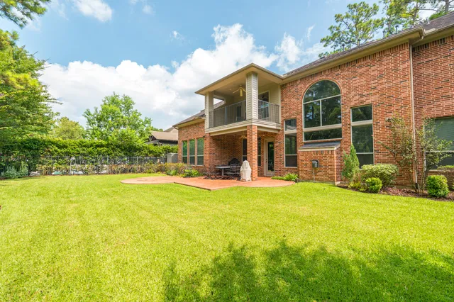 a view of a house with a swimming pool