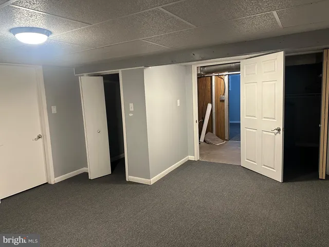 a view of empty room with closet