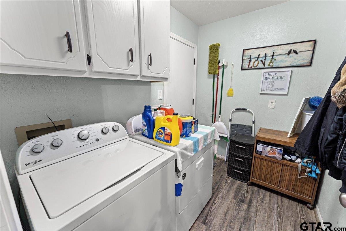 403 Kennedy Street Lindale, TX 75771 - Photo 19 of 36 a utility room with dryer and washer