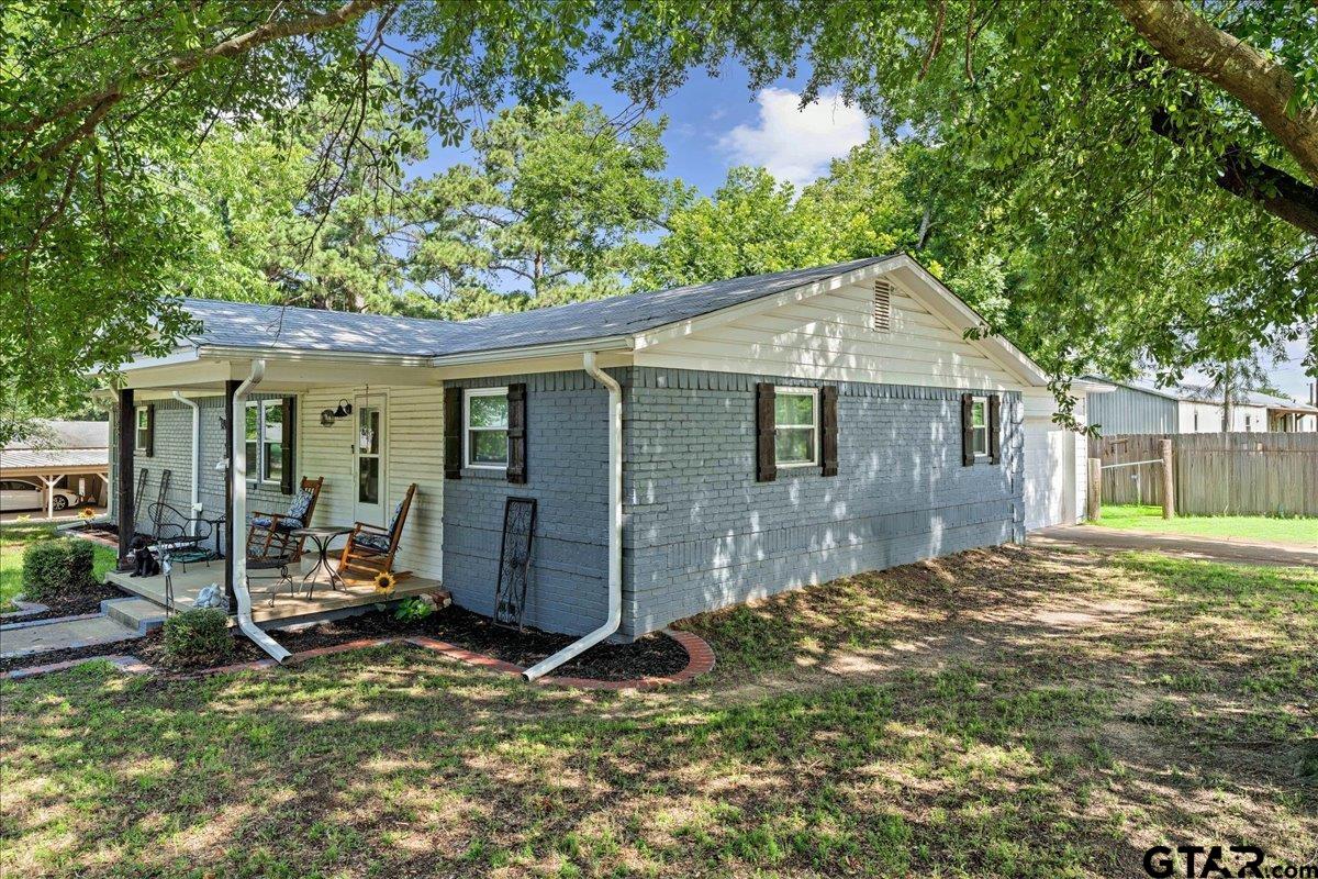 403 Kennedy Street Lindale, TX 75771 - Photo 33 of 36 a view of a house with backyard