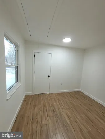 a bathroom with a toilet and a sink