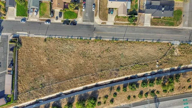 a view of a balcony and a yard