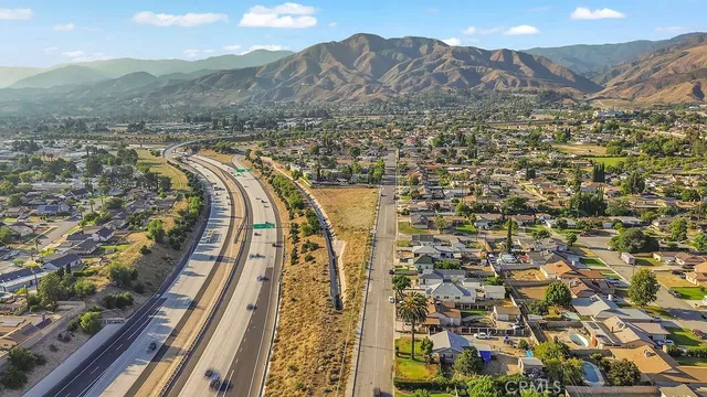 a view of a city with mountains