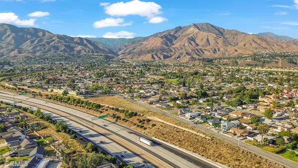 a view of a city with mountain