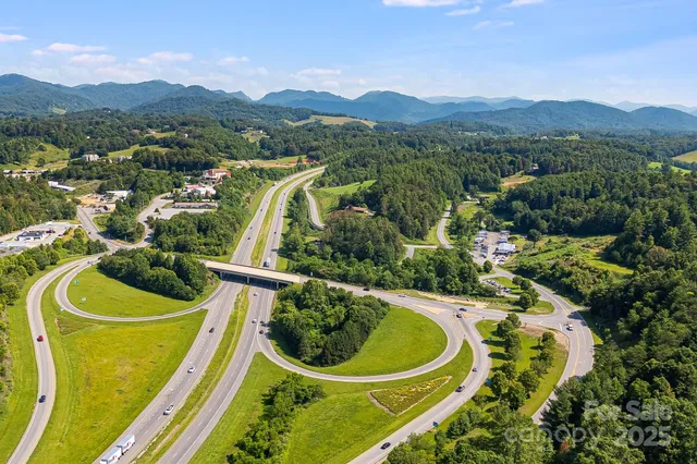an aerial view of a house with a garden