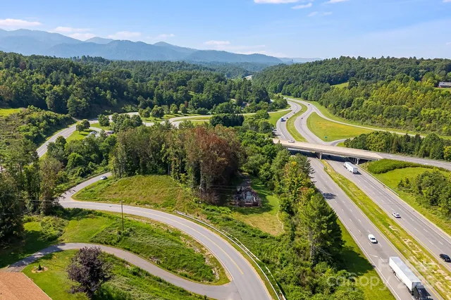 a view of swimming pool with a garden