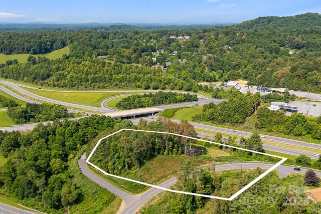 a view of swimming pool with a garden