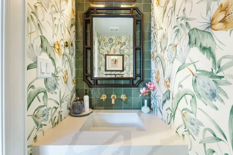 a living room with fireplace furniture and a flat screen tv