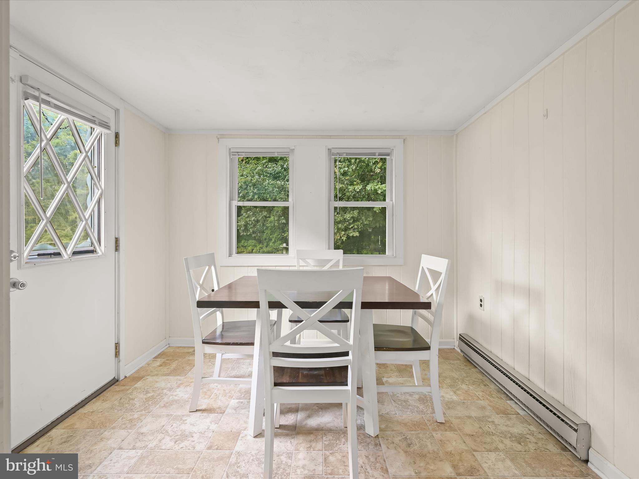 6768 Mink Hollow Road Highland, MD 20777 - Photo 3 of 40 Dining room w/ yard access